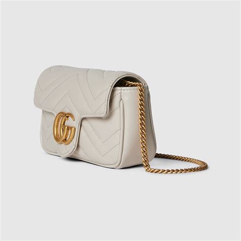 etichetta rossa gucci|Mini borsa GG Marmont in pelle grigio chiaro .